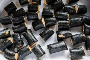 Making homemade chicken seaweed roll