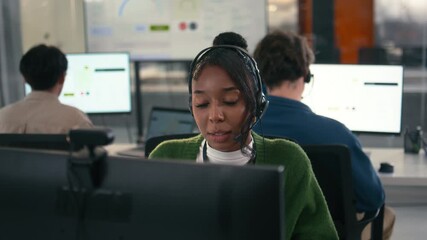 Telemarketing, Young Female Customer Service Agent talking, typing and helping client via headset using computer in call center office. Professional Female IT Support, Operator talk with client. - Powered by Adobe
