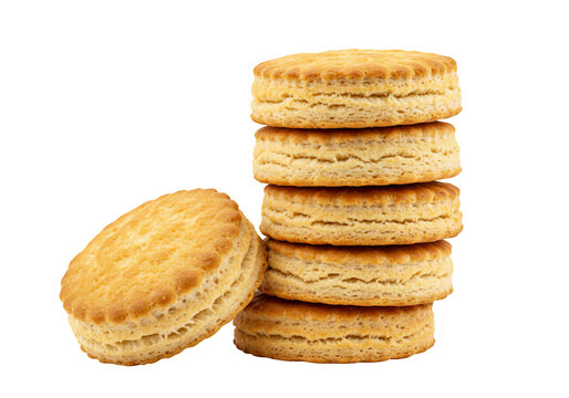 Close up of stacked golden brown biscuits on transparent background