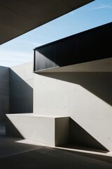 Obraz premium Modern Architectural Structure with Concrete Stairs and Shadows