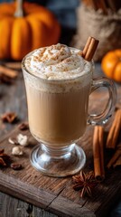 Warm spiced drink with whipped cream and cinnamon