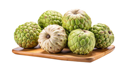 Obraz premium Custard apples displayed on a wooden surface, creating a tropical fruit still life