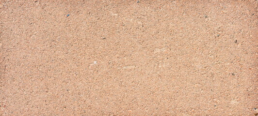 The texture of the brick is coarsely enlarged