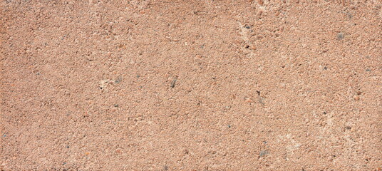 The texture of the brick is coarsely enlarged