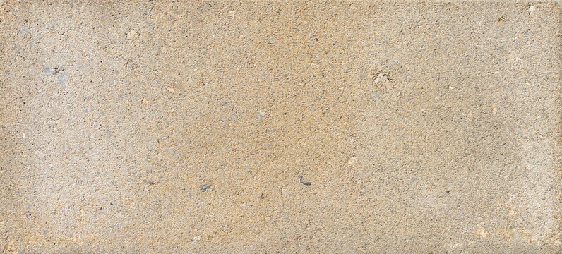 The texture of the brick is coarsely enlarged