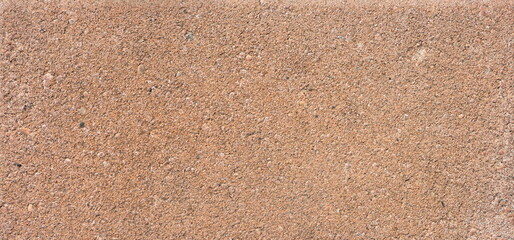 The texture of the brick is coarsely enlarged