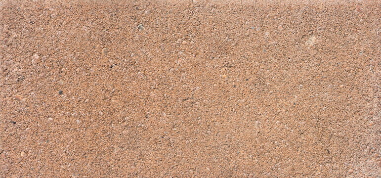 The texture of the brick is coarsely enlarged