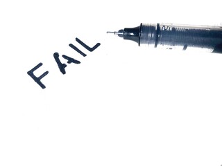 Black pen and Fail word written on a white background.