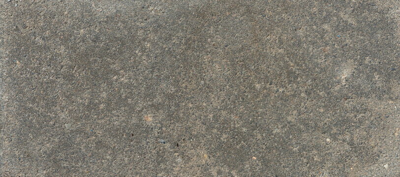 The texture of the brick is coarsely enlarged