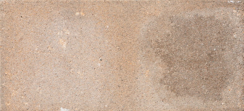 The texture of the brick is coarsely enlarged
