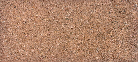 The texture of the brick is coarsely enlarged