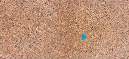 The texture of the brick is coarsely enlarged