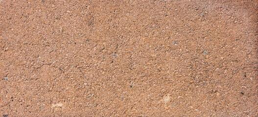 The texture of the brick is coarsely enlarged