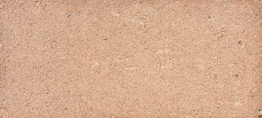 The texture of the brick is coarsely enlarged