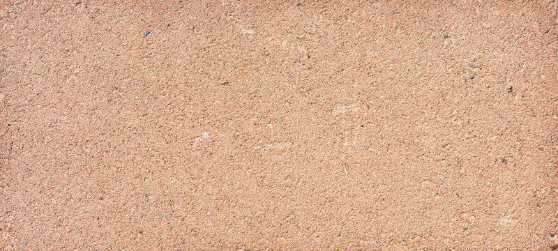 The texture of the brick is coarsely enlarged