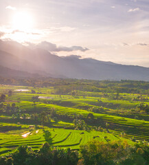 Obraz premium Wonderful sunrise scenery indonesia nature mountain valley forest with bright sky