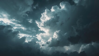 Dark storm clouds in the sky with sunlight breaking through, creating an intense and dramatic atmosphere.