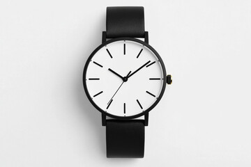 Minimalist black and white analog wristwatch with leather strap and modern design, showing precise time, stylish accessory for men and women
