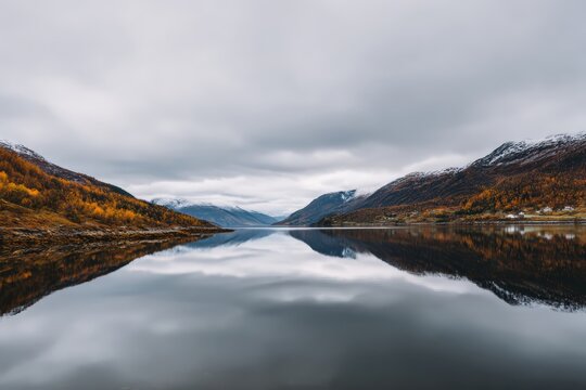 Lake reflection with mountains and sky