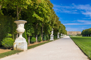 Footpath next to the green carpet leading to the Palace of Versailles, France