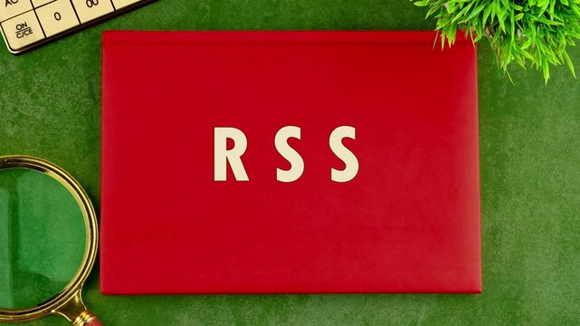 RSS Aircraft Animation on a business book with a red cover. Social media concept. 4K
