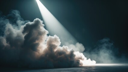 A beam of light shines through dark clouds and mist over the water, creating a dramatic, atmospheric scene.