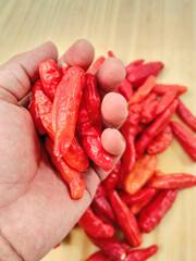 Spicy Red Goat Chili on Wooden Surface