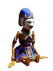 Wayang Golek Puppet: A meticulously crafted wooden puppet of wayang golek, with traditional clothing and expressive features, telling stories through its artistry and preserving heritage.