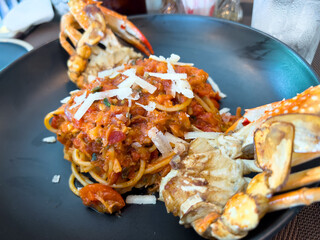 Delicious Crab Pasta with Tomato Sauce and Cheese