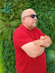 senior man with christmas tree