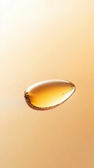 Fototapeta premium Golden macro drop of batana oil on smooth skin, symbolizing deep hydration, natural glow, and minimalist skincare aesthetics.
