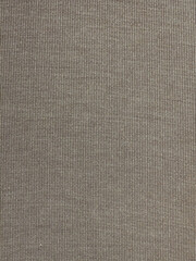 Close up macro texture of brown woven fabric with vertical thin stripes