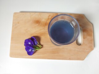 Butterfly pea (Clitoria Ternatea) or bunga telang tea as a herbal drink has benefits as an...