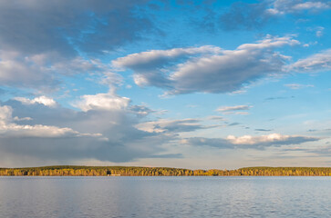 Blue lake with cloudy sky, natural background