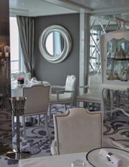 Formal and elegant a la carte ocean view dining room restaurant onboard luxury cruiseship or cruise...