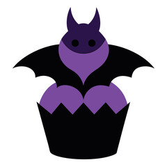 Whimsical chocolate cupcake with black bat wings and festive halloween decorations