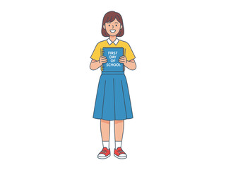 First Day of School: A young schoolgirl, full of excitement, stands proudly holding a sign as she embarks on the adventure of her academic year.