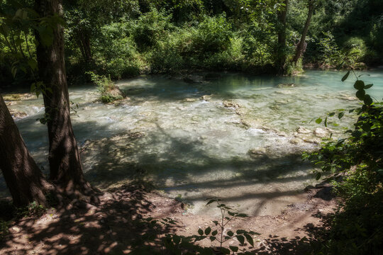River Park of the Elsa in Tuscany with Turquoise Waters and Lush Vegetation