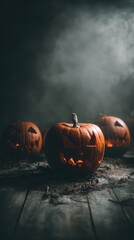 Halloween pumpkins lit with spooky expressions