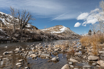 Landscape of Truckee River with rocks near Reno city in the state of Nevada at winter time, USA