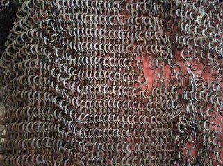 Chain mail texture. Old chain mail. Rusty texture of rings. Knights' clothing. Museum