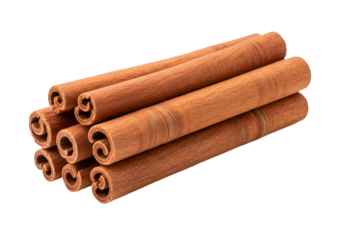 Close-up of several cinnamon sticks arranged on a black background showcasing their natural