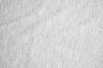 Close-up of white textured fabric showcasing soft and minimalistic design