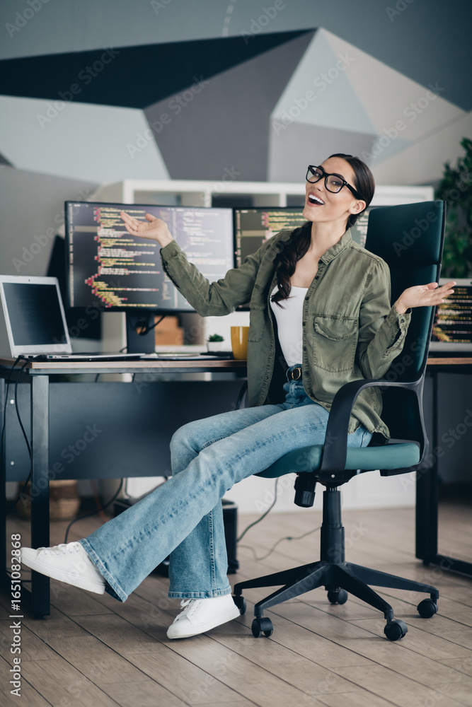 Poster young female developer enjoying a productive software coding session in a modern office workspace su