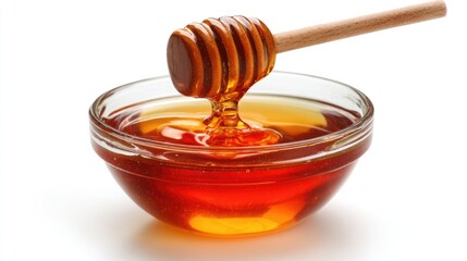 Honey pot and dipper on white background.