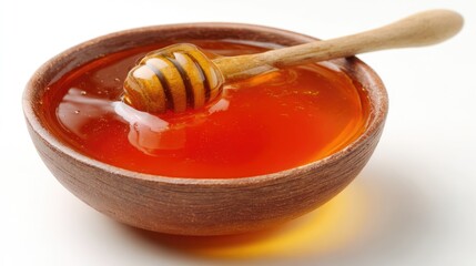 Honey pot and dipper on white background.