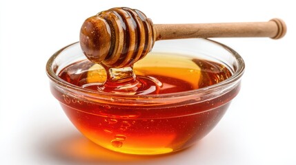 Honey pot and dipper on white background.