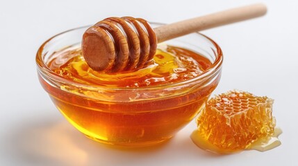 Honey pot and dipper on white background.
