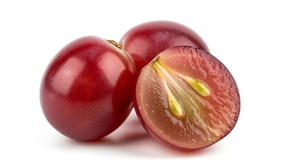 Fresh ripe red grapes one cut open showing seeds and pulp