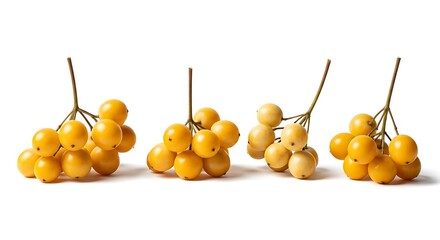 Clusters of ripe yellow cherry tomatoes on white background